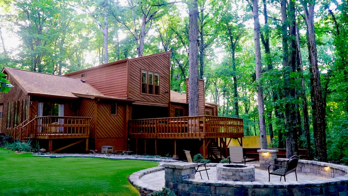 Grace Forest Retreat Center exterior with fire pit
